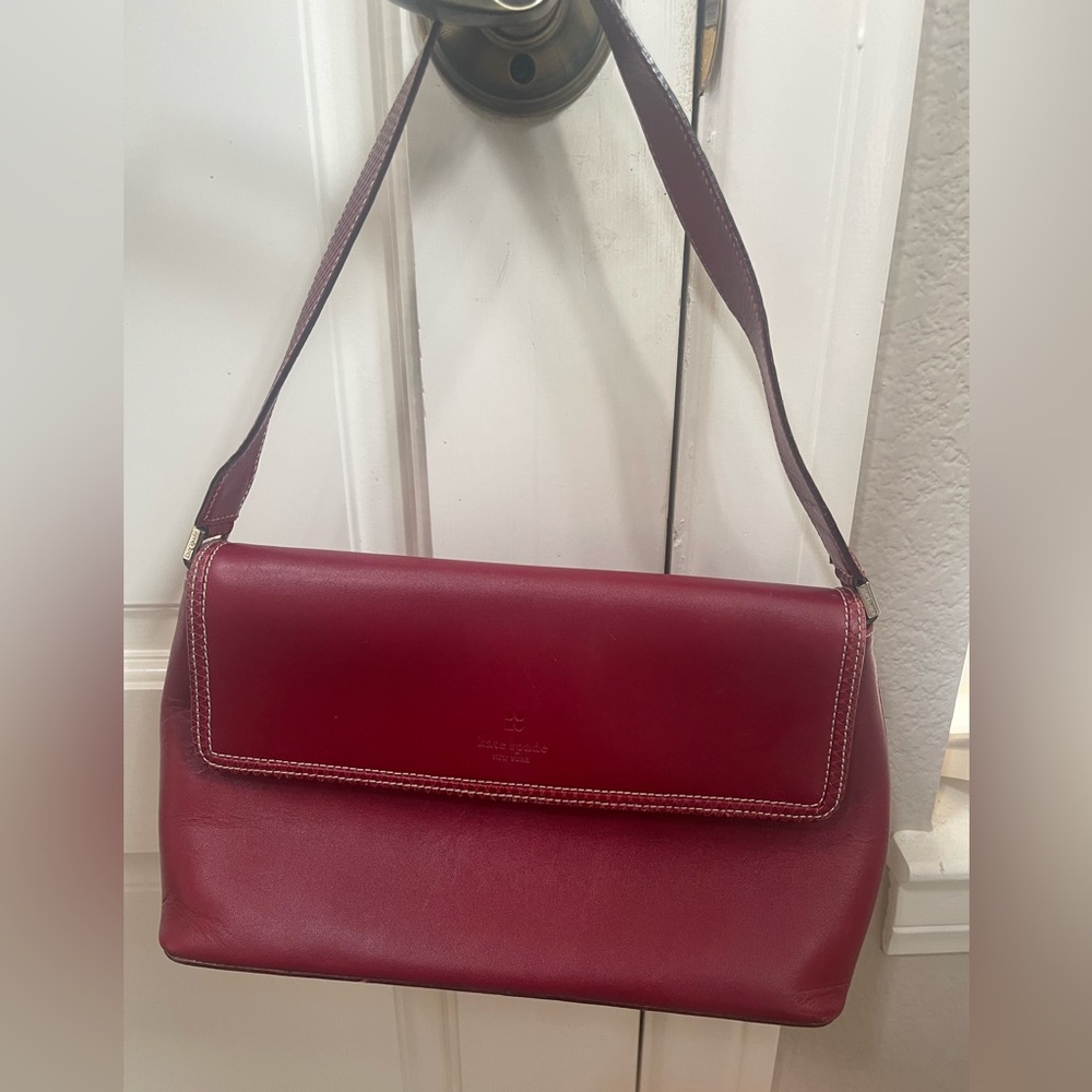 Kate Spade Red Leather Shoulder Bag with snakeskin like leather shoulder strap.